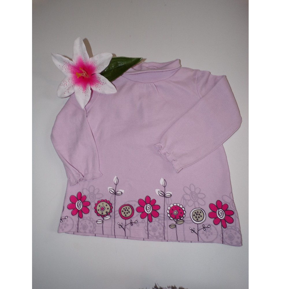 Maillot manches longues rose avec des fleurs